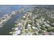 Beautiful aerial view of the waterfront community, showcasing its tranquil setting and water access at 411 Harbor View Ln, Largo, FL 33770