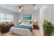 Comfortable staged bedroom with modern furniture, soft textures, and warm, inviting decor at 411 Harbor View Ln, Largo, FL 33770