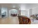 Open floor plan view of the dining room and kitchen, with an elegant table setting and seating at 411 Harbor View Ln, Largo, FL 33770