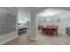 Bright, open space featuring a kitchen with white cabinetry and stainless steel appliances at 411 Harbor View Ln, Largo, FL 33770
