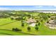 Luxury home with pool, situated on spacious lot with lake views at 10603 Low Oak Ter, Thonotosassa, FL 33592