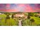 Luxury home with pool and expansive grounds, offering stunning sunset views at 10603 Low Oak Ter, Thonotosassa, FL 33592