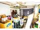 Garage filled with various boxes, furniture, and household items at 2109 58Th S St, Gulfport, FL 33707