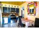 Kitchen with dark blue cabinets and brick backsplash at 2109 58Th S St, Gulfport, FL 33707