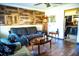 Spacious living room with a wooden coffee table and view into kitchen at 2109 58Th S St, Gulfport, FL 33707