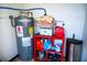 Room with water heater and storage shelving at 2109 58Th S St, Gulfport, FL 33707