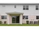 Backyard featuring a covered patio and well-maintained landscaping at 31907 Anchor Point Dr, Wesley Chapel, FL 33545