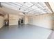 Large garage with ample storage and laundry area at 4943 Sandy Brook Cir, Wimauma, FL 33598