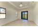 Spacious office with large window and neutral decor at 15154 Appleton Blvd, Port Charlotte, FL 33981