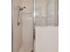 Shower stall with glass enclosure and tile surround at 6919 Surrey Hill Pl, Apollo Beach, FL 33572