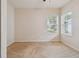 Bright bedroom with neutral walls and carpet at 6919 Surrey Hill Pl, Apollo Beach, FL 33572