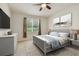 Spacious Primary bedroom with large windows and modern decor at 6919 Surrey Hill Pl, Apollo Beach, FL 33572