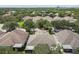 Community overview showing numerous homes and landscaping at 6919 Surrey Hill Pl, Apollo Beach, FL 33572