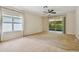 Spacious living room with sliding doors to patio at 6919 Surrey Hill Pl, Apollo Beach, FL 33572