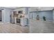 Modern kitchen with stainless steel appliances and white cabinets at 3303 Russett Dr, Tampa, FL 33618