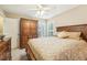 Comfortable bedroom with a queen-size bed and ample closet space at 8210 Danbury Ln, Hudson, FL 34667