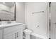 Bright bathroom featuring a white vanity and glass-enclosed shower at 2510 W Cleveland St # 2, Tampa, FL 33609