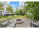 Inviting community firepit with chairs, perfect for outdoor gatherings and enjoying the serene surroundings at 2510 W Cleveland St # 2, Tampa, FL 33609