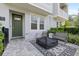 Inviting patio with stone pavers, and lush landscaping creates a welcoming entrance at 2510 W Cleveland St # 2, Tampa, FL 33609