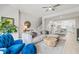 Bright and airy living room seamlessly connects to the dining area at 2510 W Cleveland St # 2, Tampa, FL 33609