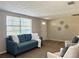 Open-concept living room featuring modern furnishings, neutral décor, and plenty of natural light at 3245 Bigelow Dr Dr, Holiday, FL 34691
