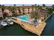 Gorgeous waterfront condo with pool, private boat slips, and tropical landscaping, perfect for Florida living at 5000 Culbreath Key Way # 4-306, Tampa, FL 33611