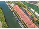 Amazing aerial view highlighting the boat docks along the intercoastal of this beautiful condo community at 5000 Culbreath Key Way # 4-306, Tampa, FL 33611