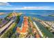 Breathtaking aerial view of a waterfront condo community, showcasing its private boat docks and ocean views at 5000 Culbreath Key Way # 4-306, Tampa, FL 33611