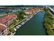 Beautiful waterfront condo community with private boat slips, lush landscaping, and stunning water views at 5000 Culbreath Key Way # 4-306, Tampa, FL 33611