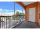 Screened-in balcony overlooking the parking area and neighborhood, providing a private outdoor space at 5000 Culbreath Key Way # 4-306, Tampa, FL 33611