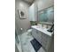 Bathroom featuring a white vanity, framed mirror, and walk-in glass shower at 5000 Culbreath Key Way # 4-306, Tampa, FL 33611