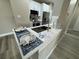 Modern kitchen featuring white cabinetry and stainless steel appliances, stylish countertop at 5000 Culbreath Key Way # 4-306, Tampa, FL 33611