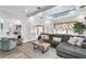 Comfortable lounge area with modern decor, large windows and an access to outdoor at 5000 Culbreath Key Way # 4-306, Tampa, FL 33611