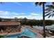 Relaxing pool area overlooking the water and docks, perfect for enjoying the waterfront lifestyle at 5000 Culbreath Key Way # 4-306, Tampa, FL 33611