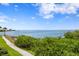 Breathtaking water views, lush greenery, and scenic walking path to enjoy nature's beauty at its finest at 5000 Culbreath Key Way # 4-306, Tampa, FL 33611
