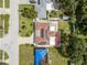 Aerial view showcasing the house, surrounding landscape, and nearby street at 201 S Duncan Ave, Clearwater, FL 33755