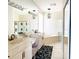 Large bathroom with double vanity and soaking tub at 6515 Virginia Xing, University Park, FL 34201
