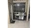 Outdoor kitchen featuring stainless steel appliances and sink at 6515 Virginia Xing, University Park, FL 34201