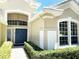 Inviting entryway with a double door and landscaping at 6515 Virginia Xing, University Park, FL 34201