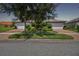 Two-car garage home with nicely landscaped yard at 15626 Aurora Lake Cir, Wimauma, FL 33598