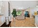 Open living room with tile floors and view of the backyard at 15626 Aurora Lake Cir, Wimauma, FL 33598