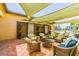 Relaxing community patio area with shaded seating at 15626 Aurora Lake Cir, Wimauma, FL 33598