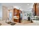 Open kitchen boasting stainless steel appliances, ample counter space, and a tile backsplash at 15626 Aurora Lake Cir, Wimauma, FL 33598