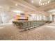 Large meeting room with ample seating for events at 15626 Aurora Lake Cir, Wimauma, FL 33598