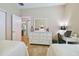 Bedroom with two twin beds and dresser at 15626 Aurora Lake Cir, Wimauma, FL 33598