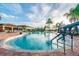 Enjoy this refreshing community pool with plenty of lounge chairs at 15626 Aurora Lake Cir, Wimauma, FL 33598