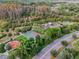 Aerial view of community amenities including a basketball court at 15626 Aurora Lake Cir, Wimauma, FL 33598