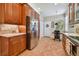 Modern kitchen with stainless steel appliances and granite countertops at 15626 Aurora Lake Cir, Wimauma, FL 33598