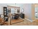 Inviting dining room features a round table and stylish decor at 15626 Aurora Lake Cir, Wimauma, FL 33598