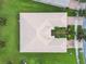 Aerial view of house showing roofline and landscaping at 15626 Aurora Lake Cir, Wimauma, FL 33598